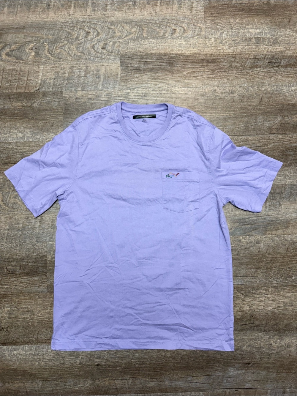 Greg Norman purple shirt
